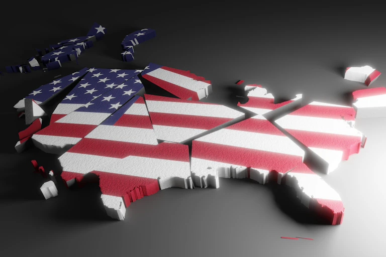 A blck map of the U.S. shattered into pieces.