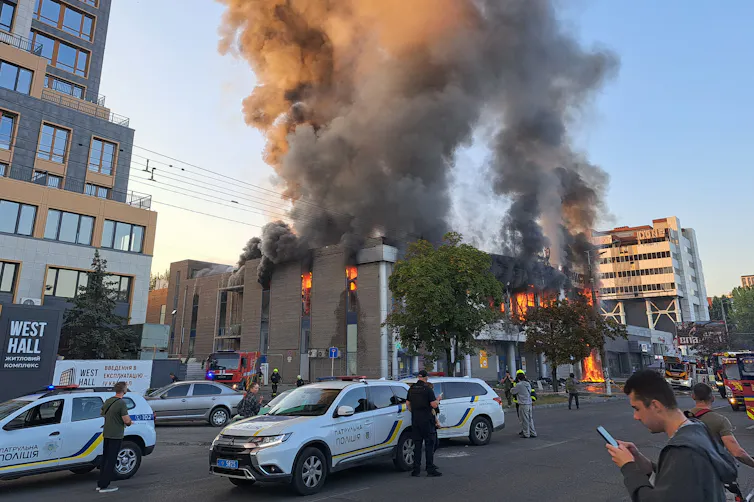 Smoke bellows from a building