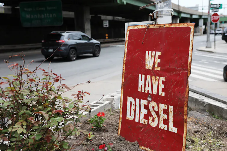 A sign outside a gas station says 'we have diesel.'