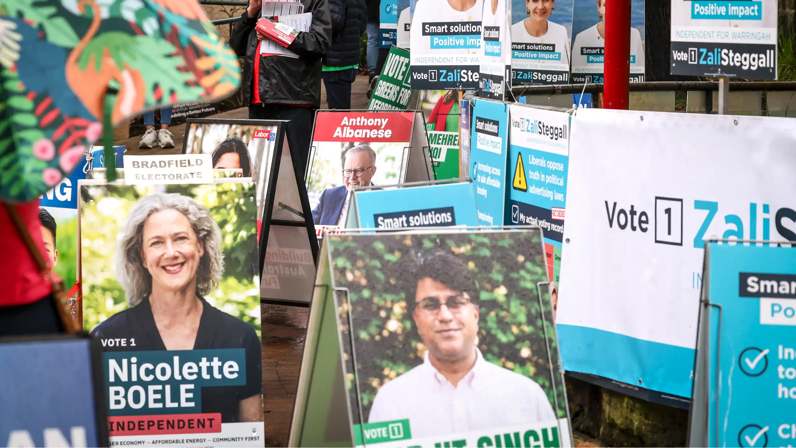 A mass of political signs for different candidates
