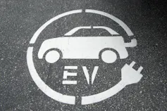 EV charging symbol on a parking spot