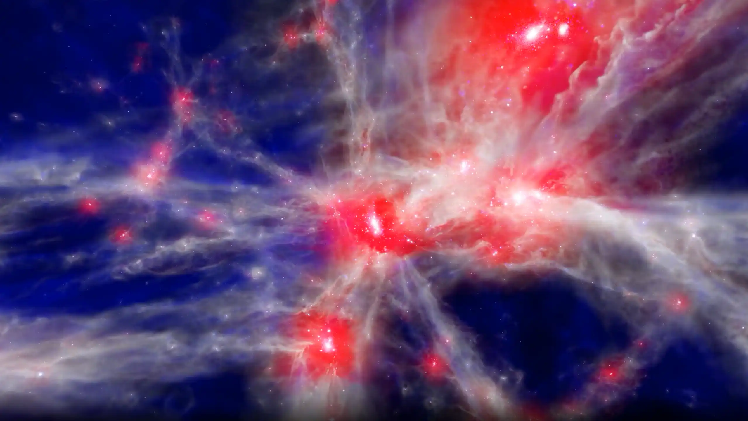 Computer-generated imagery of white and red filaments on a purple background with energetic red spots