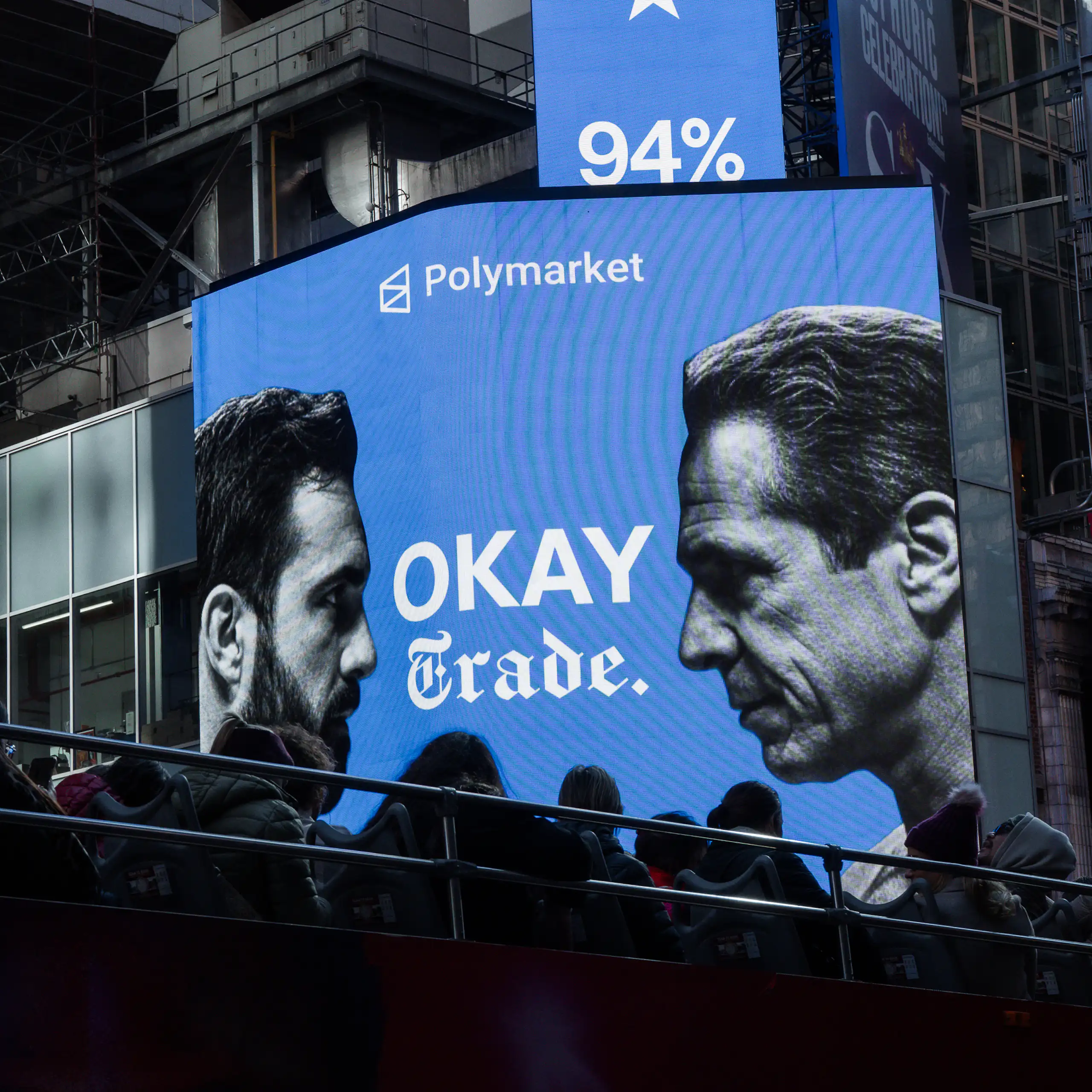 An advertisement of two men facing each other, with the words 'Okay trade' between them