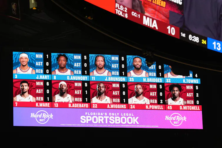An ad for a sports betting app displayed on a screen