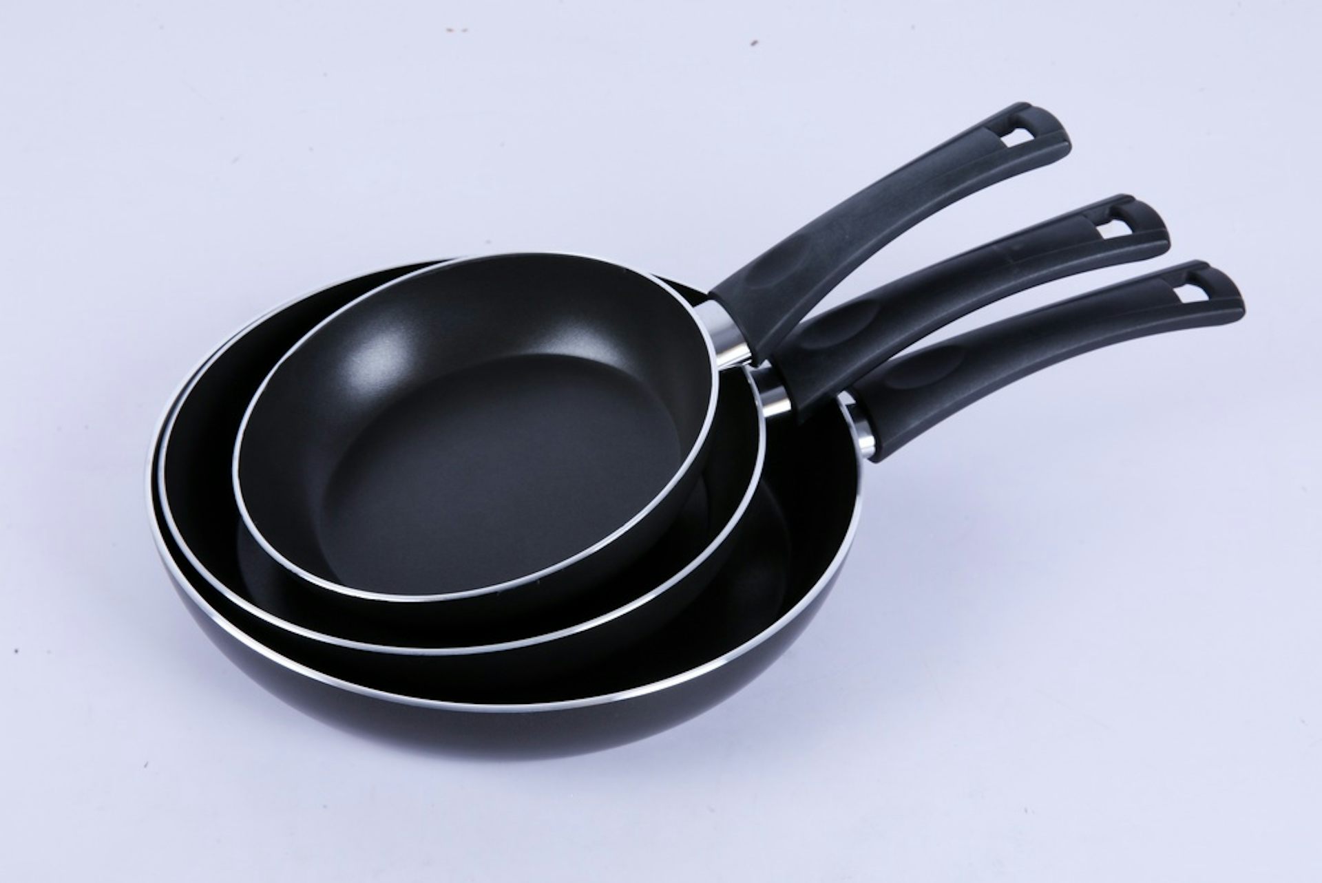 A stack of non-stick pans.