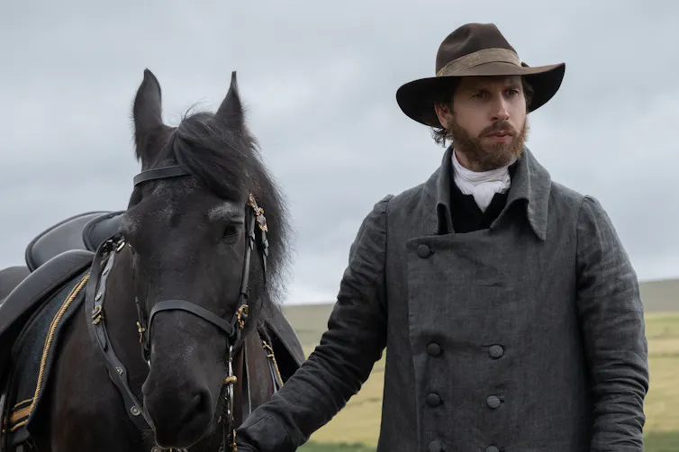 Colonel Brandon with his horse