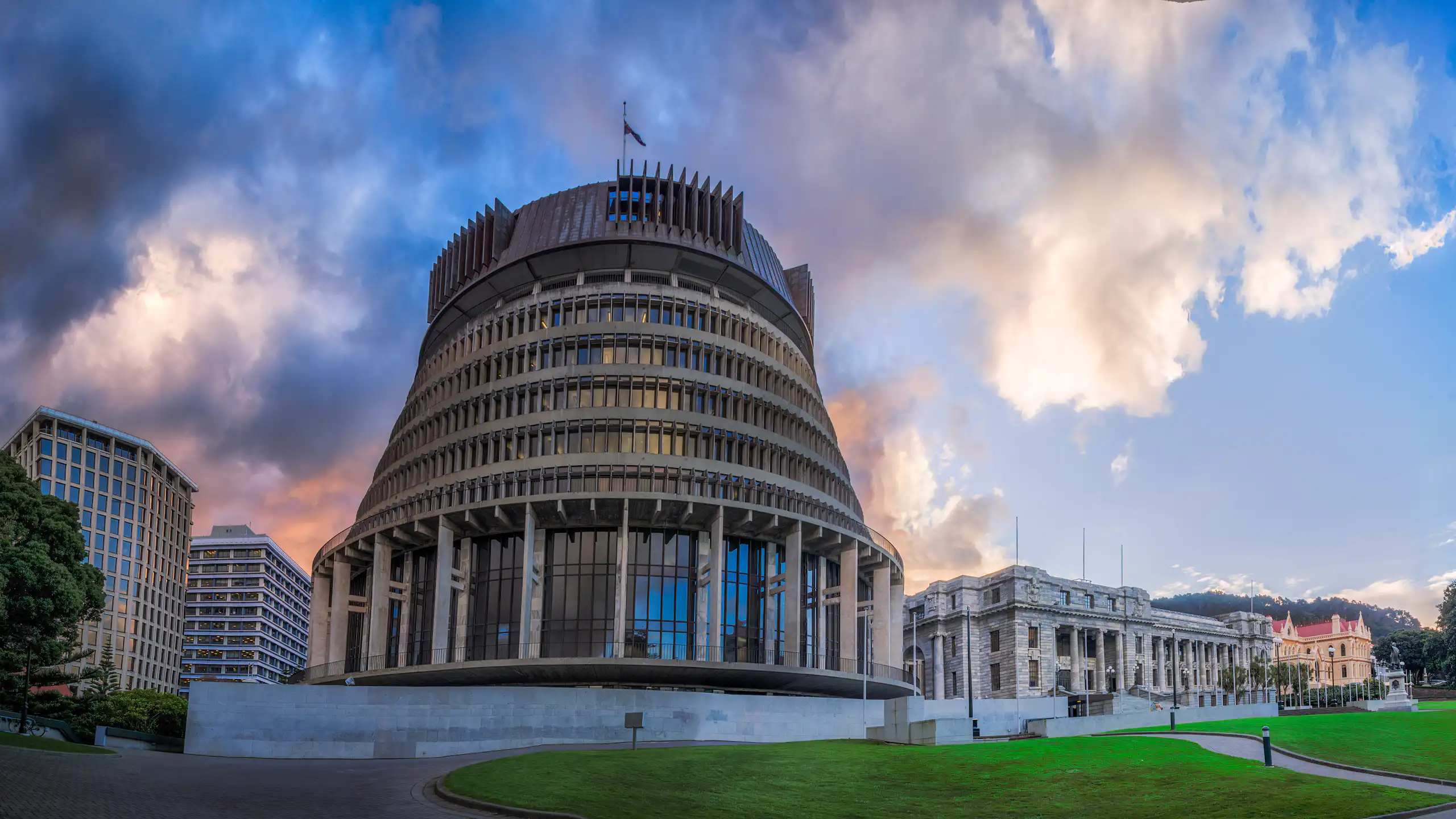 Beehive government and parliament buildings under clouds