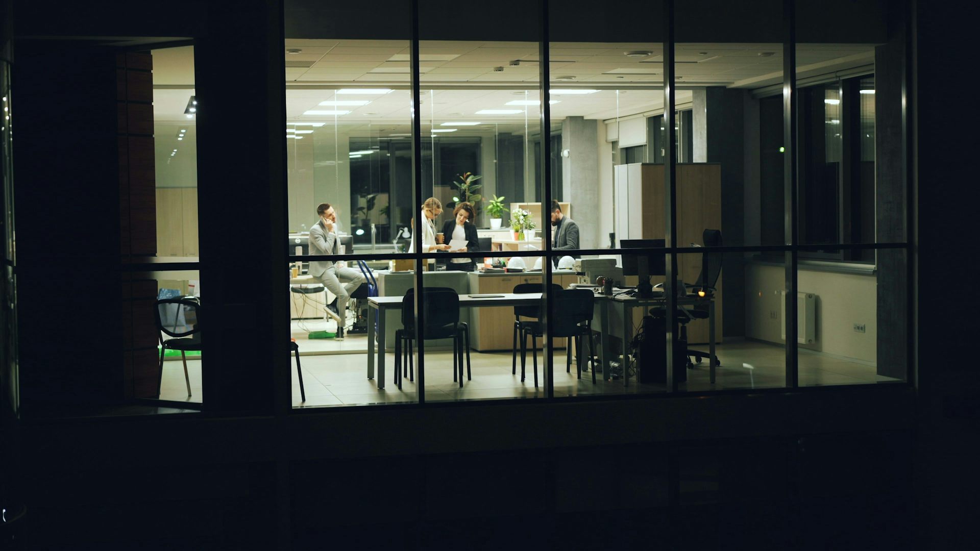 People working in an office buliding late at night