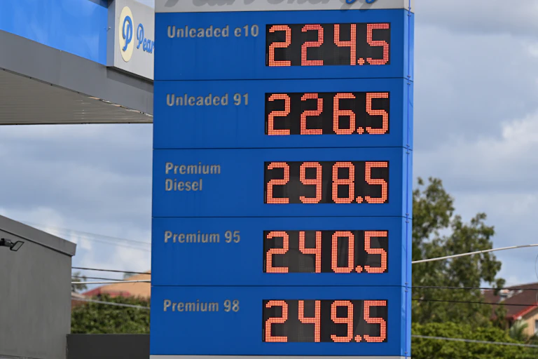 Signage showing fuel prices at a petrol station in Brisbane