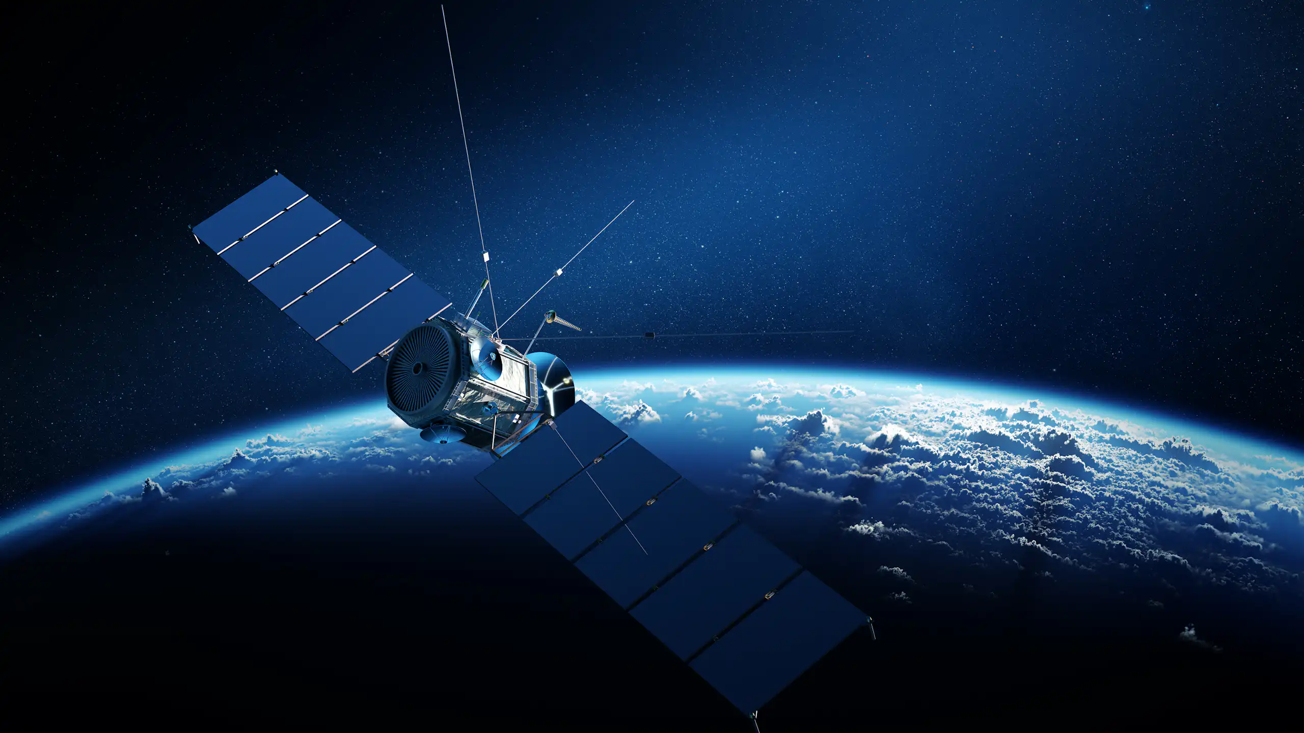 A communications satellite orbiting Earth