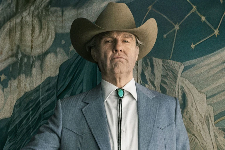 Tom Cruise in a stetson and suit as Digger Rockwell.