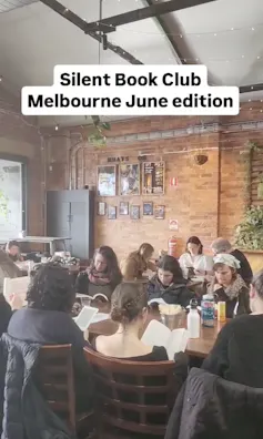 People reading in a cafe.