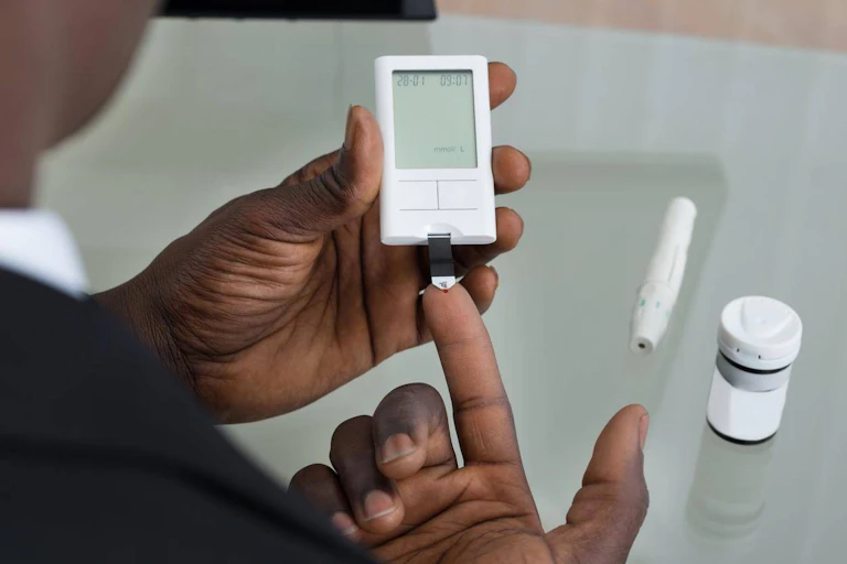 A person checking their blood sugar levels