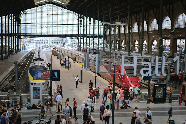 Travelers gather on the concourse of Gare du nord in Paris.