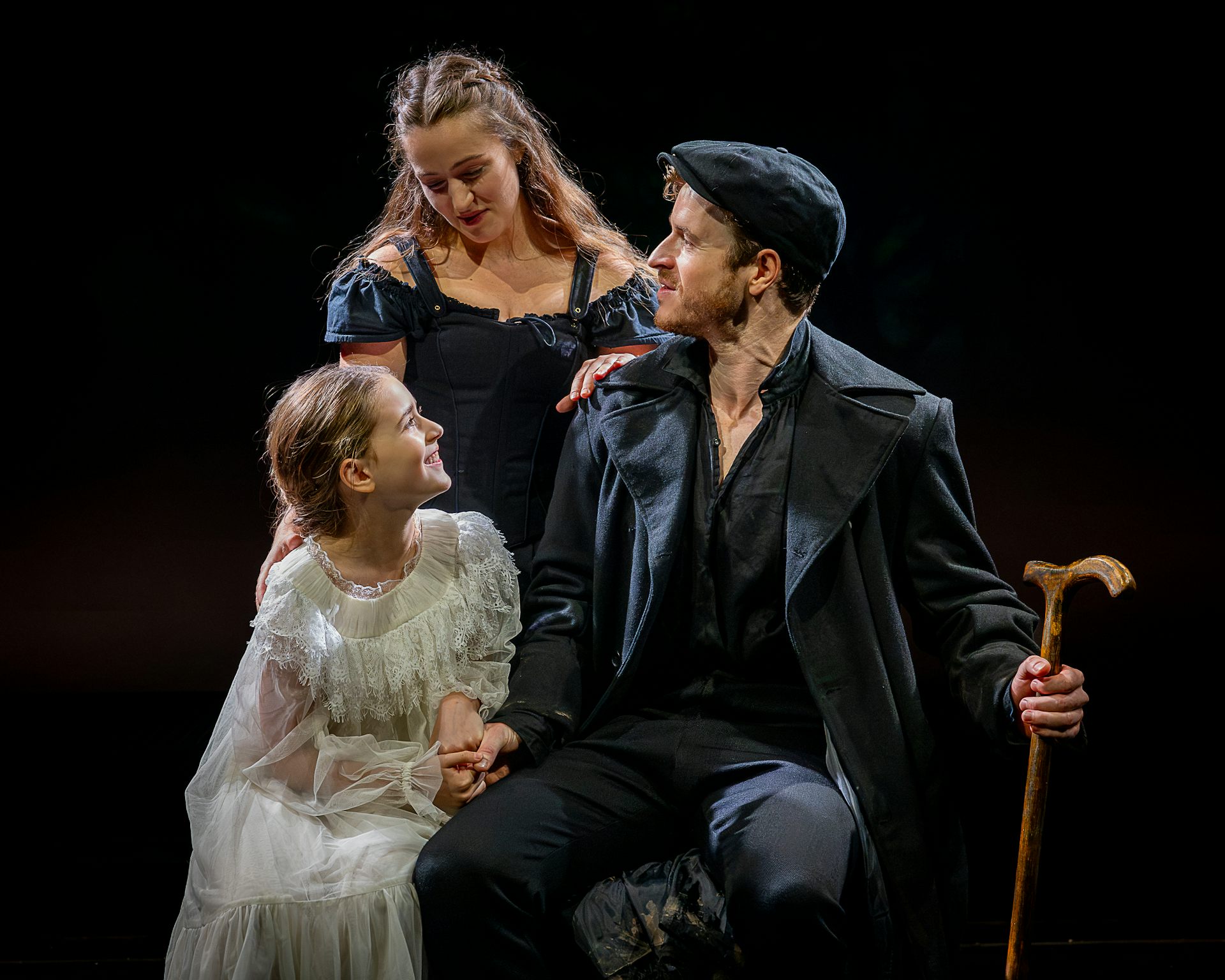 Jane Eyre, Rochester and his ward Adele on stage.