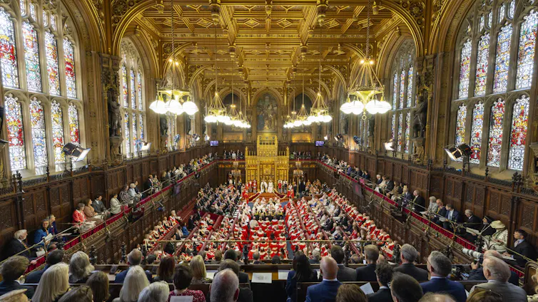 peers in ermine in the house of lords chamber for the state opening of parliament 2026 with the king and queen.