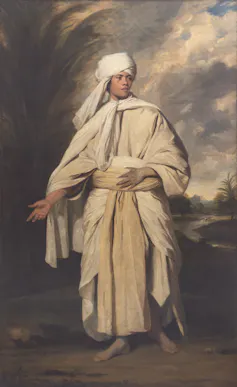 Oil painting of a barefoot Polynesian man standing heroically in flowing white robes.