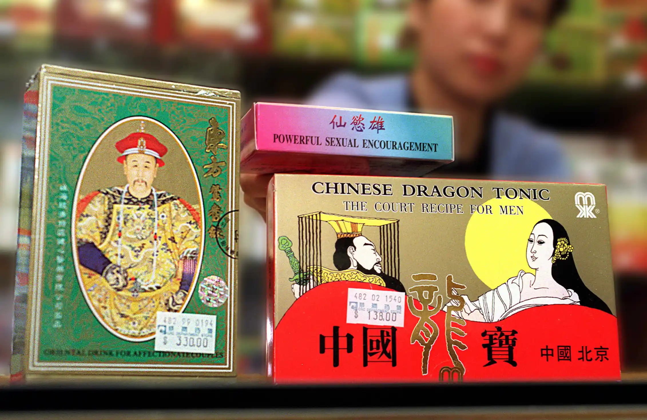 sexual enhancement drugs in packaging with Chinese characters alongside English labels