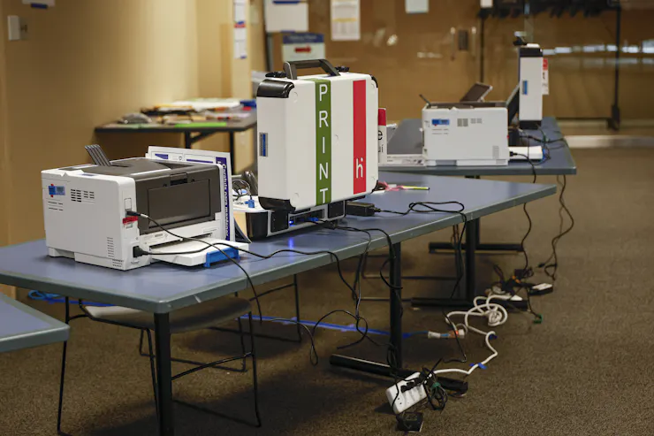 A number of different machines sitting on a table.