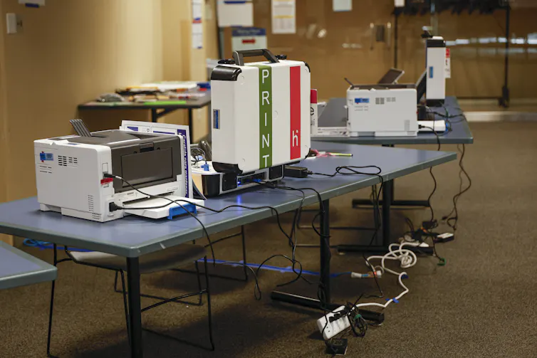 A number of different machines sitting on a table.
