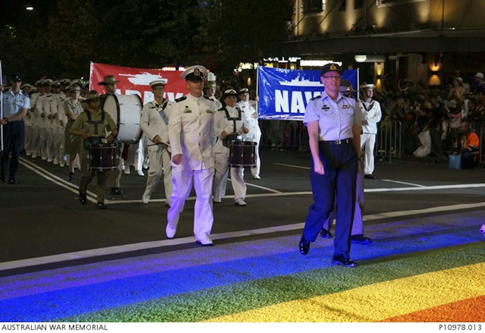 An RAAF Air Commodore leads the uniformed Australian Defence Force contingent in the 2013 Mardi Gras parade across the 