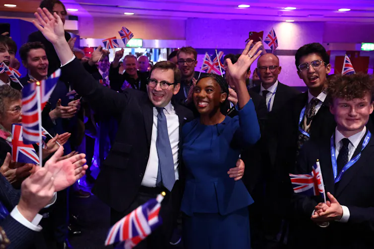 Kemi and husband Hamish Badenoch cheered on by delegates after her speech