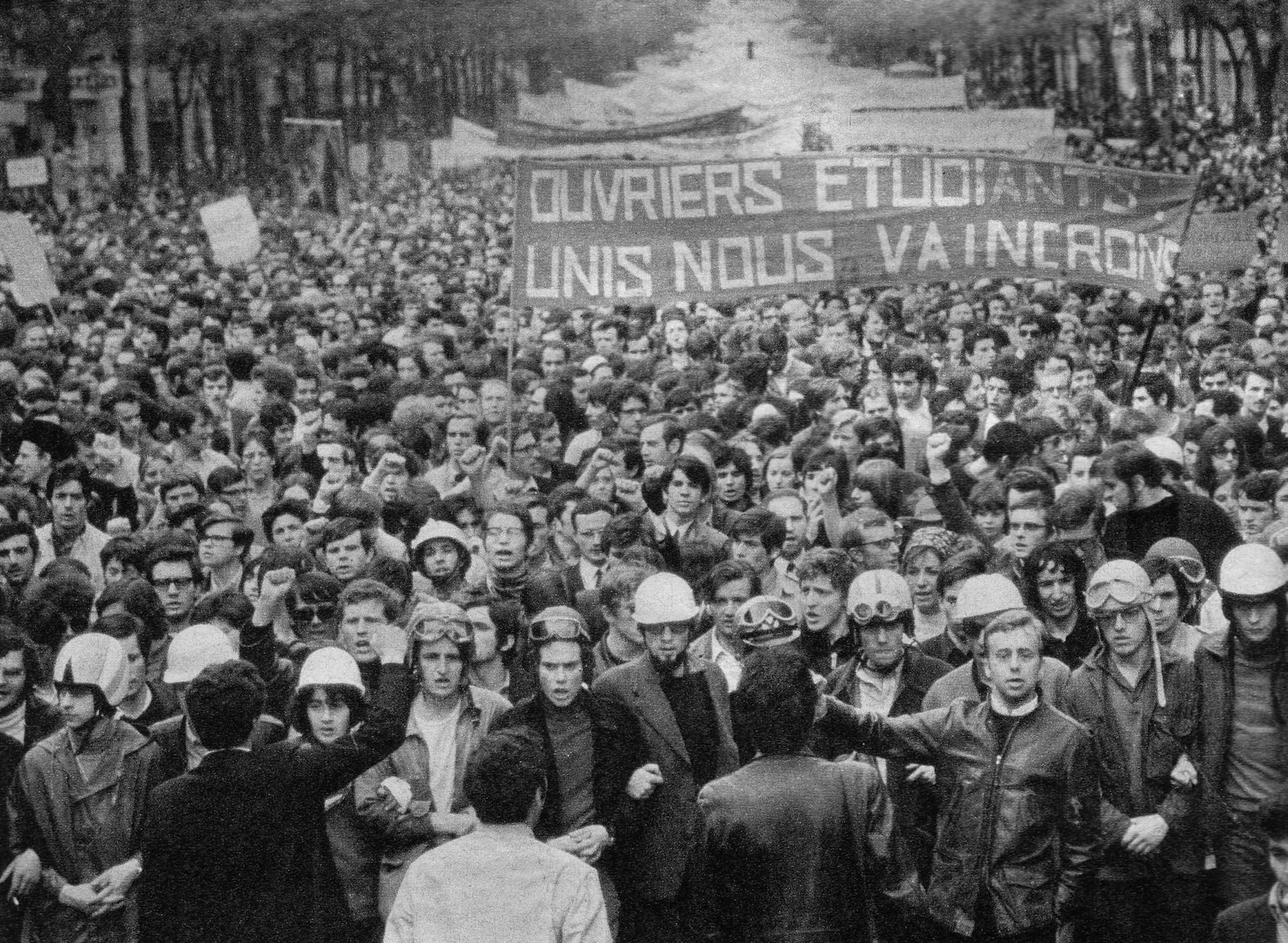 A crowd of young people on a Paris street in 1968.