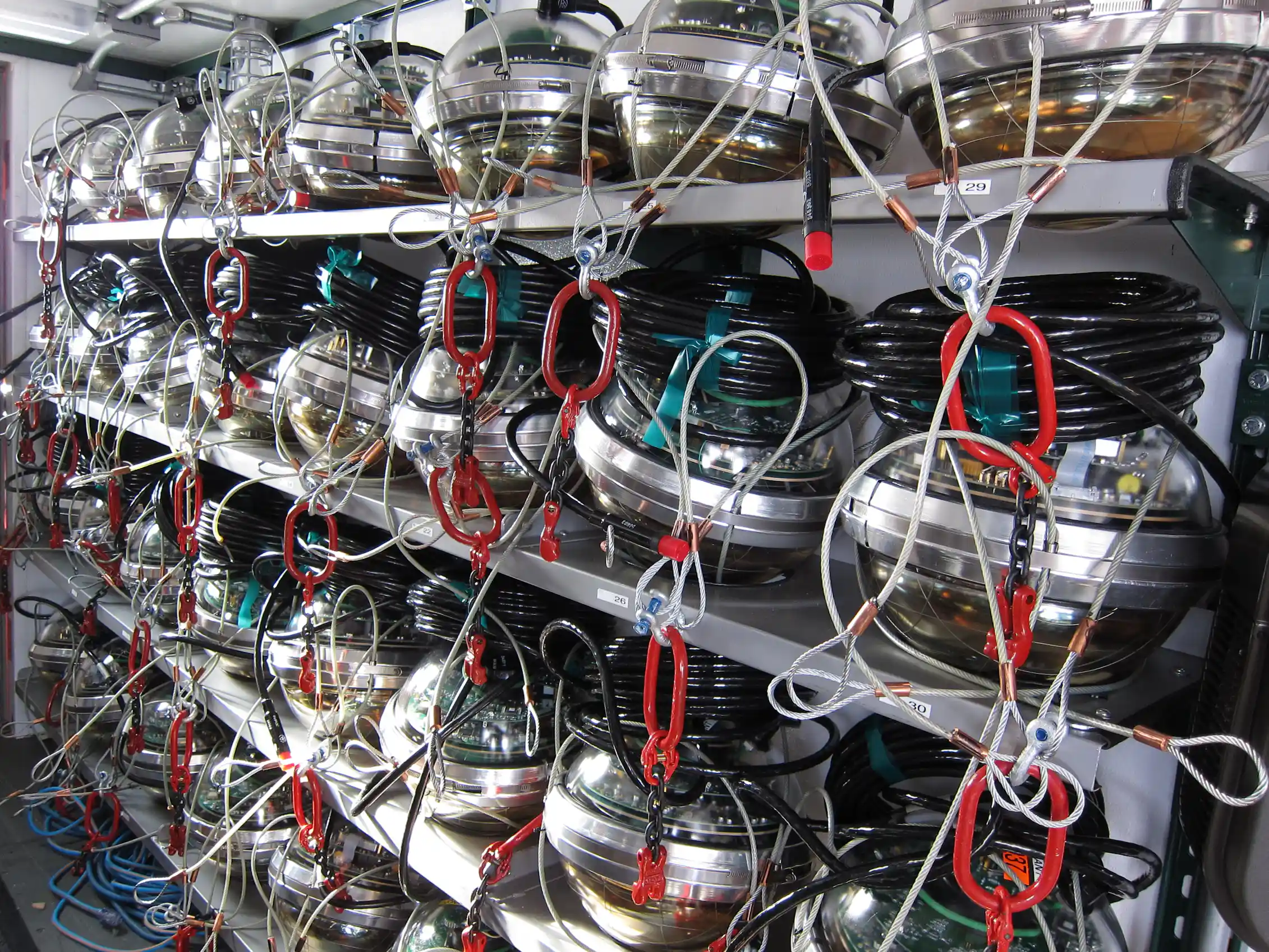 A unit of shelving containing rows of circular sensor modules.