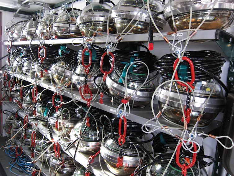 A unit of shelving containing rows of circular sensor modules.