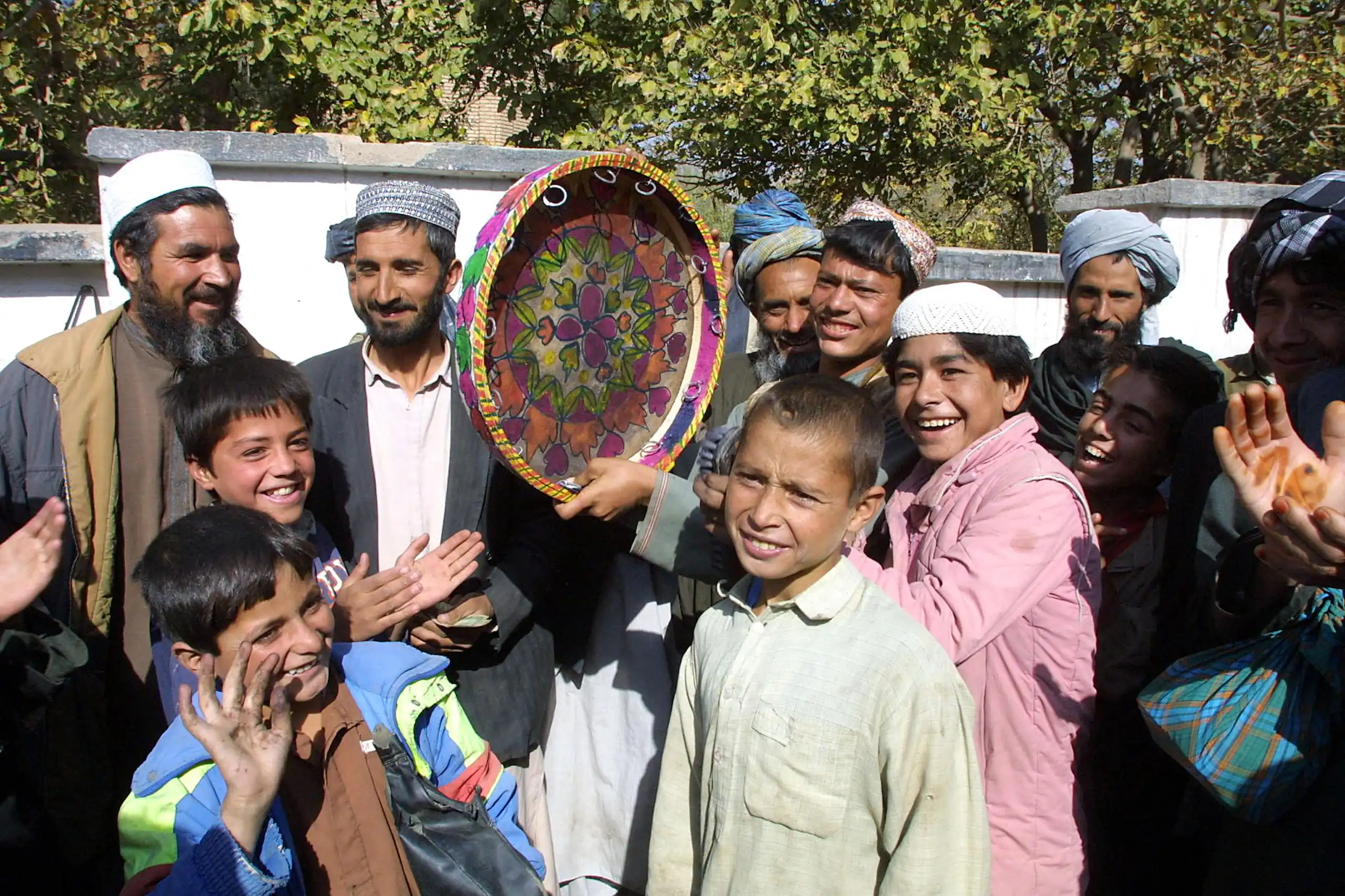 People in Afghanistan dance during a celebration after the Taliban's fall in 2001.