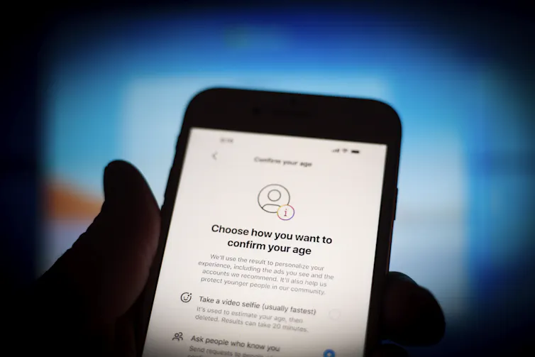 phone screen showing message asking user to verify age