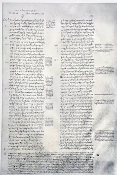 A manuscript page with two columns, and small notes printed in the margins.
