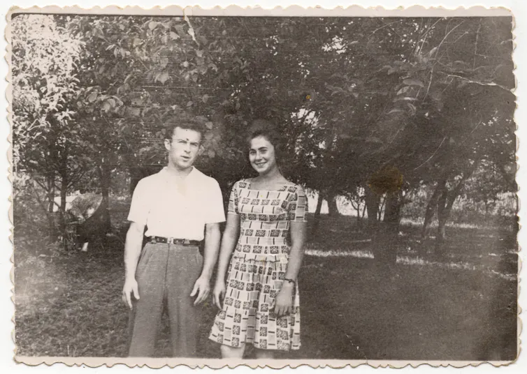 A couple in a black and white photo from the 1970s.