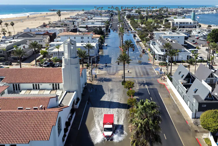 Flooded streets in a coastal town.