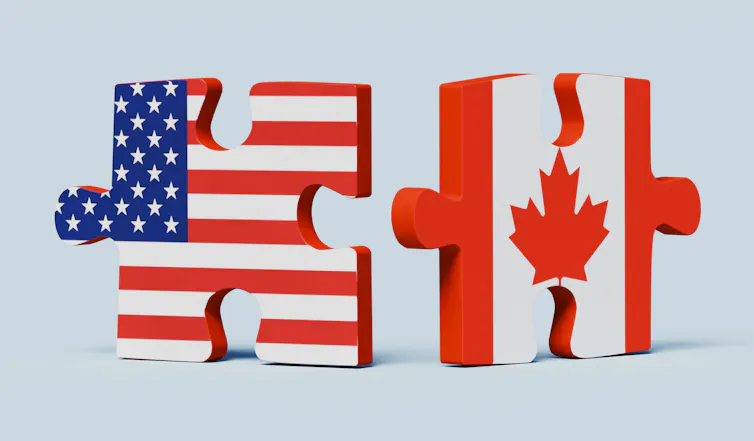 Two puzzle pieces, one with a U.S. flag and the other with a Canadian flag, stand next to each other, close but not quite connected.