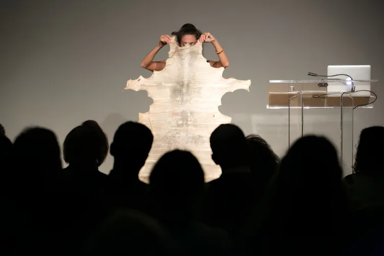 Giannisi holding her aigis during performance in 2016.