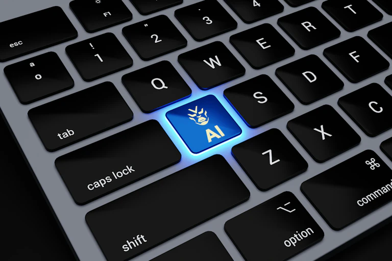 A close up of a laptop keyboard with a backlit 'A' key replaced with the letters AI