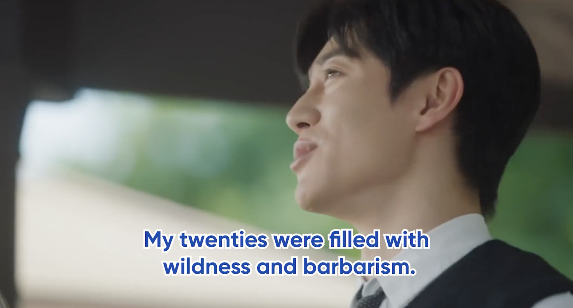 A young Korean man in profile, with words reading My twenties were filled with wildness and barbarism.