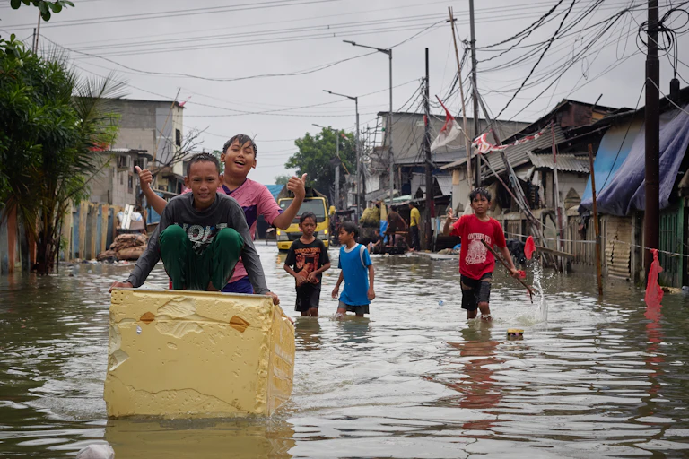 Children play in floods