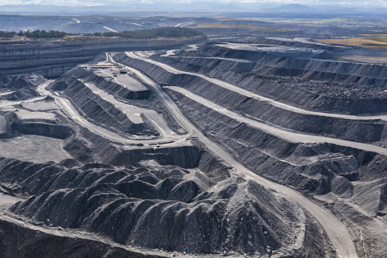 An aerial view of a large open-cut coal mine