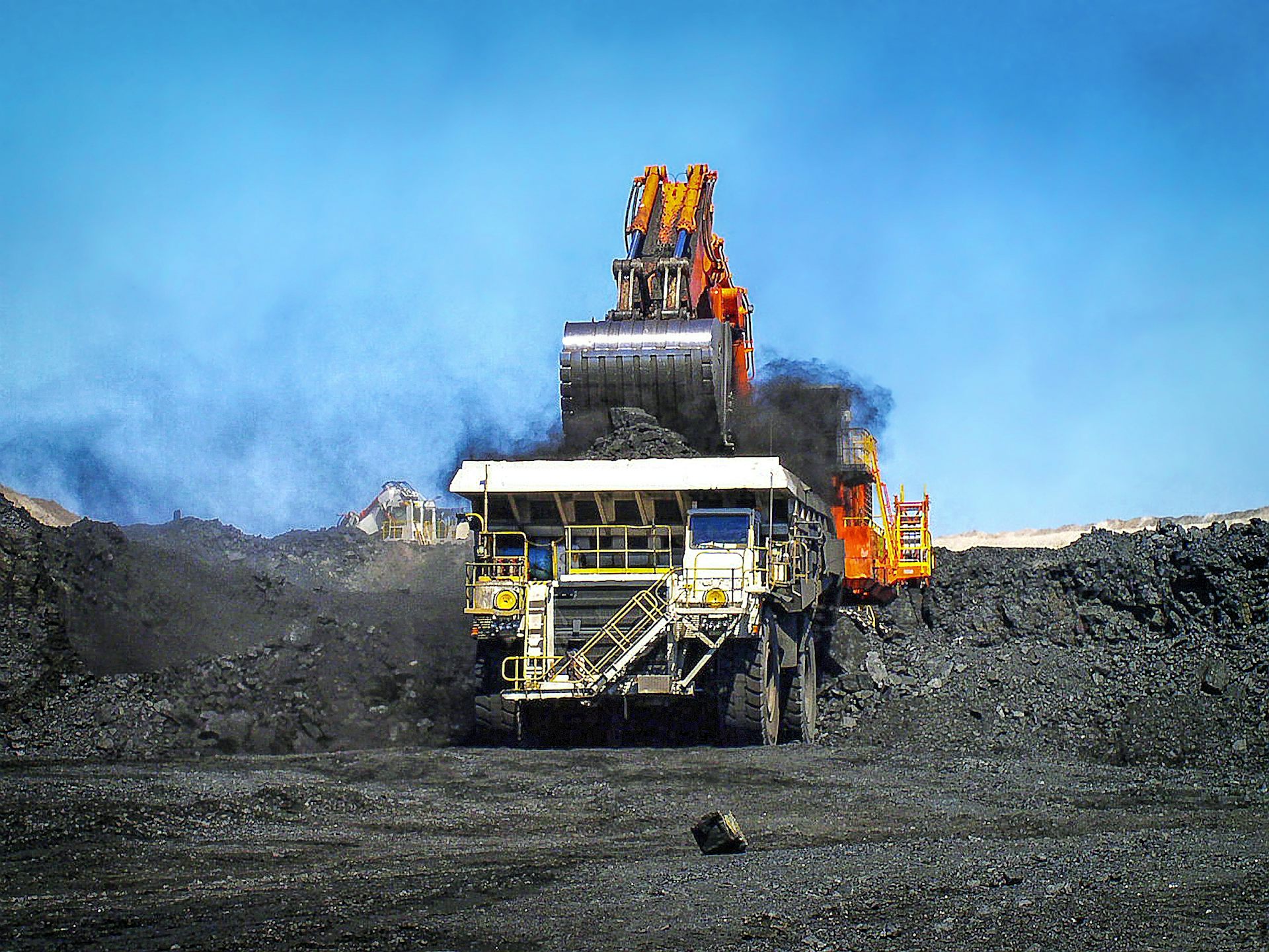 A coal truck being loaded in an open-cut coal mine.