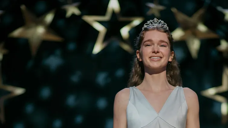 Summer H. Howell as Carrie at prom