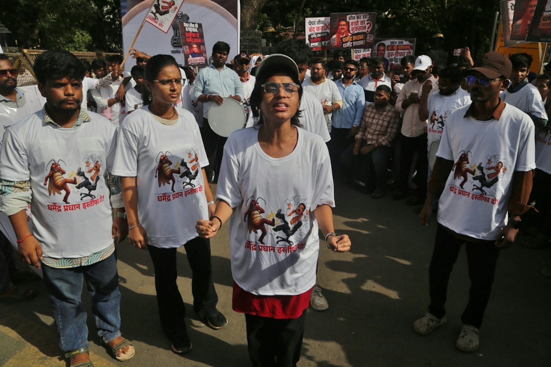 Protestors on street in India calling for education minister to resign