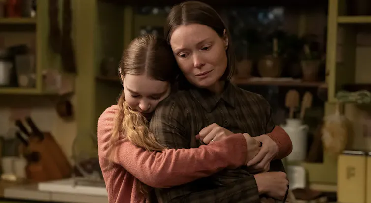 Carrie hugging her mother