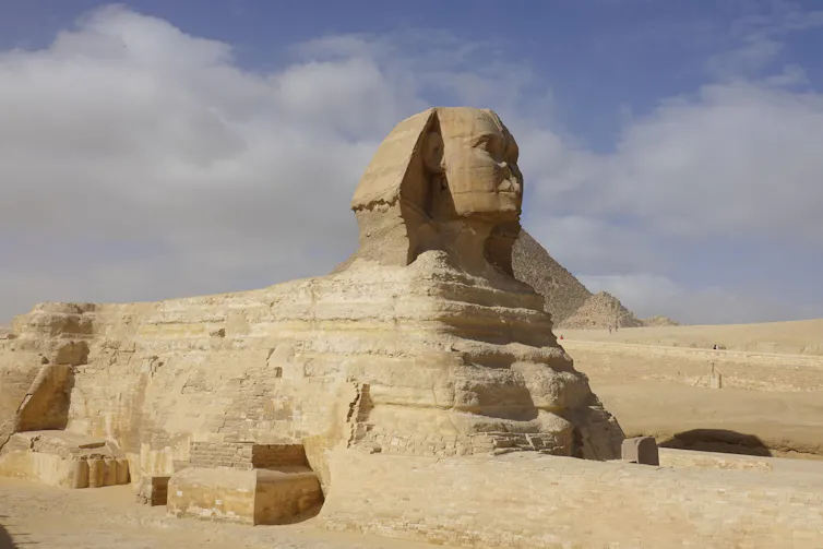 Enormous sphinx carved from stone.