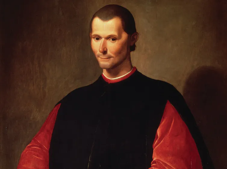 A portrait of a man in red and black, casting a shadow.