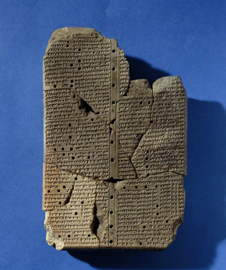 A partially restored cuneiform tablet.