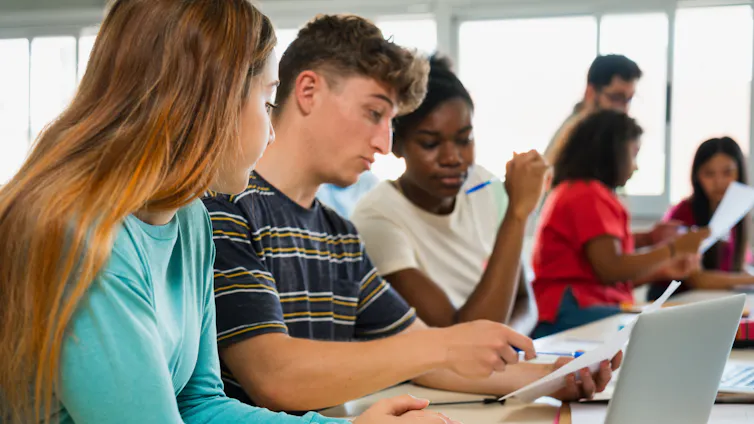 Teenager students learning together.
