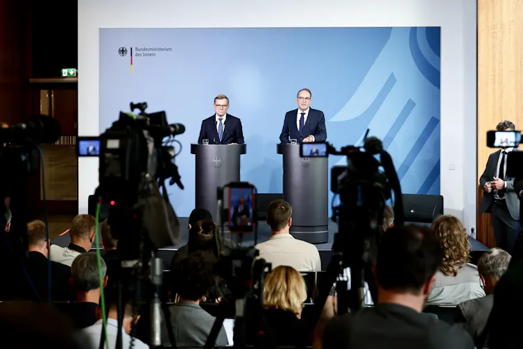 Alexander Dobrindt and Johann Wadephul speak to the press following the drone incident at Leipzig Airport.