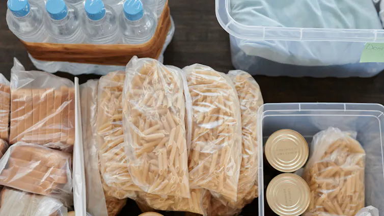 Bottled water, bread and cans.